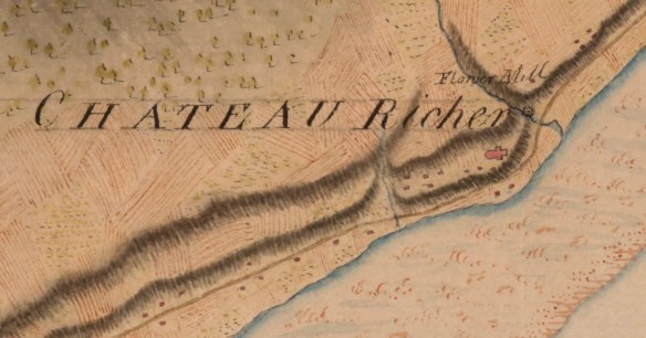 Carte en couleurs montrant une rivière et un village avec les mots Château Richer écrits près du centre.